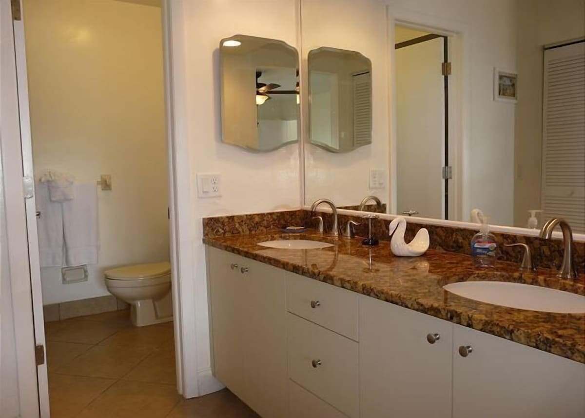 Bathroom with a double granite vanity